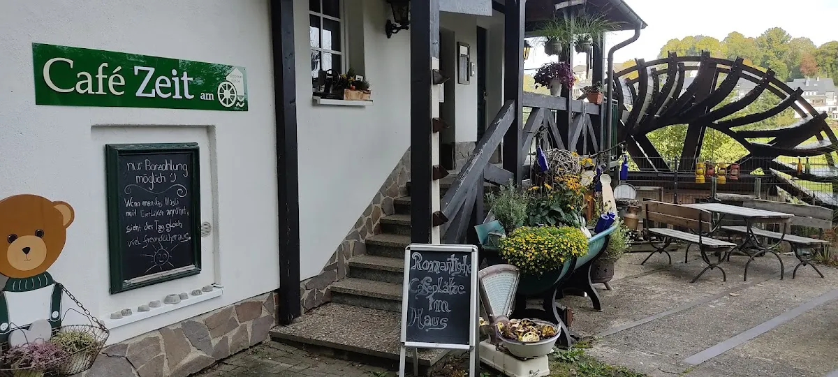 BookNoFees: Restaurang – Café Zeit am Wasserrad – Schmallenberg – Café Zeit vid vattenhjulet, bild 1